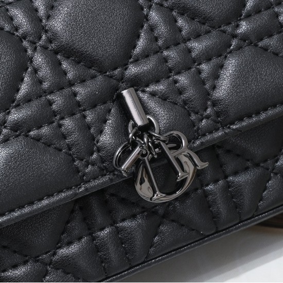 200 WITH BOX LADY DIOR MOBILE PHONE POUCH BLACK GUN CLOSURE This Lady Dior cell phone pouch is elegantly crafted in creamy white sheepskin leather with a rattan check pattern and a removable light gold-tone metal DIOR charm with a detachable chain adorned