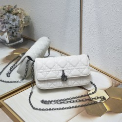 200 WITH BOX LADY DIOR MOBILE PHONE POUCH WHITE GUN CLOSURE This Lady Dior cell phone pouch is elegantly crafted in creamy white sheepskin leather with a rattan check pattern and a removable light gold-tone metal DIOR charm with a detachable chain adorned
