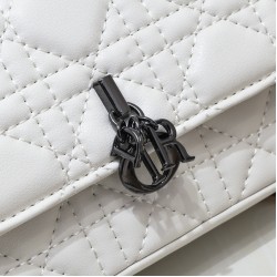 200 WITH BOX LADY DIOR MOBILE PHONE POUCH WHITE GUN CLOSURE This Lady Dior cell phone pouch is elegantly crafted in creamy white sheepskin leather with a rattan check pattern and a removable light gold-tone metal DIOR charm with a detachable chain adorned