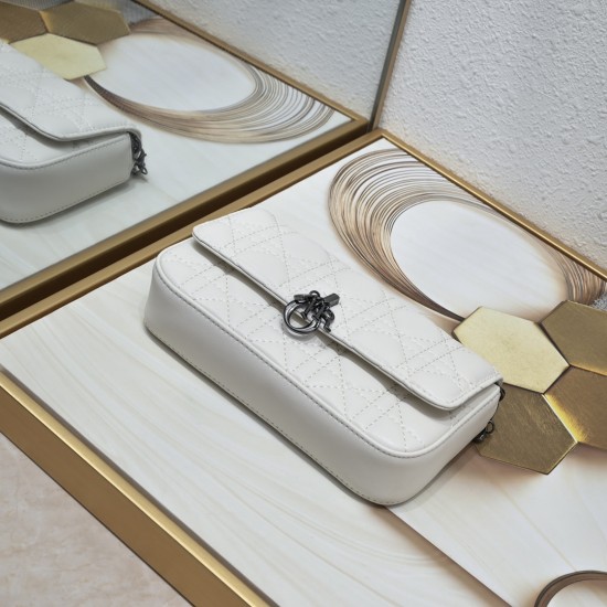 200 WITH BOX LADY DIOR MOBILE PHONE POUCH WHITE GUN CLOSURE This Lady Dior cell phone pouch is elegantly crafted in creamy white sheepskin leather with a rattan check pattern and a removable light gold-tone metal DIOR charm with a detachable chain adorned