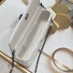 200 WITH BOX LADY DIOR MOBILE PHONE POUCH WHITE GUN CLOSURE This Lady Dior cell phone pouch is elegantly crafted in creamy white sheepskin leather with a rattan check pattern and a removable light gold-tone metal DIOR charm with a detachable chain adorned