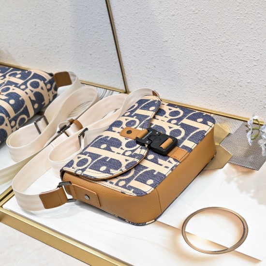 NEW SHIPPING 260 ORIGINAL BLUE FABRIC FEATURED TOP OF THE LINE WITH LEATHER ORIGINAL This mini saddle messenger bag is smart and stylish, crafted in black grained cowhide leather with a flap closure and the DIOR logo to emphasize the sophistication and ch