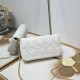 200 WITH BOX LADY DIOR MOBILE PHONE POUCH WHITE GOLD BUCKLE This Lady Dior cell phone pouch is elegantly crafted in creamy white sheepskin leather with a rattan check pattern and a removable light gold finish metal DIOR charm with a detachable chain adorn