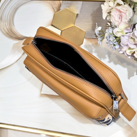 Large 250 This Rider 20 zippered messenger bag is practical and compact, ideal for everyday use, crafted in black Oblique printed fabric with the Dior logo on the front embellished with black grained cowhide leather details, zippered compartment and front