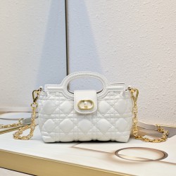 210 The Dior Jolie Top Handle Mini Chain Handbag is a new addition to the Early Spring 2016 Ready-to-Wear collection and features an elegant and sophisticated design crafted in creamy white sheepskin leather adorned with rattan latticework flap embellishe