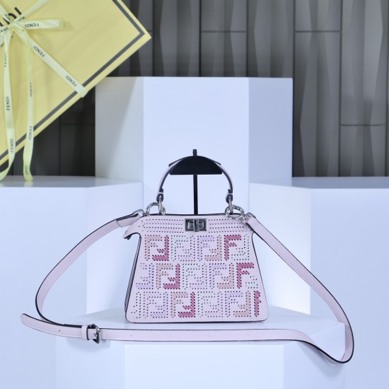 360 model 33208 the iconic peekaboo iseeu ideal compact handbag is hand stitched with 306 stitches in the same color with large bright threads representing traditional selleria craftsmanship in a selection of dove grey cuoio romano leather with signature 