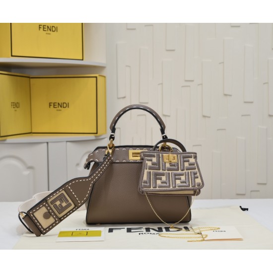 Model 3309320NEWFendi's iconic Peekaboo ISeeU medium handbag in full-grain leatherLarge, hand-stitched sides with classic twist locksFrom the outside, you can see the full-grain leather lining in the same colorTwo compartments separated by a rigid divider