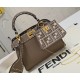 Model 3309320NEWFendi's iconic Peekaboo ISeeU medium handbag in full-grain leatherLarge, hand-stitched sides with classic twist locksFrom the outside, you can see the full-grain leather lining in the same colorTwo compartments separated by a rigid divider