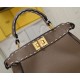 Model 3309320NEWFendi's iconic Peekaboo ISeeU medium handbag in full-grain leatherLarge, hand-stitched sides with classic twist locksFrom the outside, you can see the full-grain leather lining in the same colorTwo compartments separated by a rigid divider
