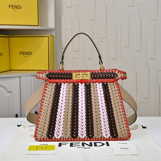 410 Model 33200 New! New in stock New in stock Iconic Peekaboo ISeeU large handbag Handmade leather weave with signature twist lock on both sidesSoft leather lining in the same color visible from the outsideTwo compartments separated by a rigid dividerFea