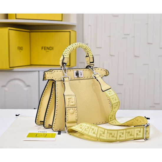 350 model 7705 the iconic peekaboo iseeu ideal compact handbag is hand-stitched with 306 stitches in the same color and large bright threads representing traditional selleria craftsmanship in a selection of dove grey cuoio romano leather with iconic natur
