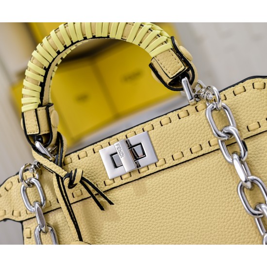 350 model 7705 the iconic peekaboo iseeu ideal compact handbag is hand-stitched with 306 stitches in the same color and large bright threads representing traditional selleria craftsmanship in a selection of dove grey cuoio romano leather with iconic natur