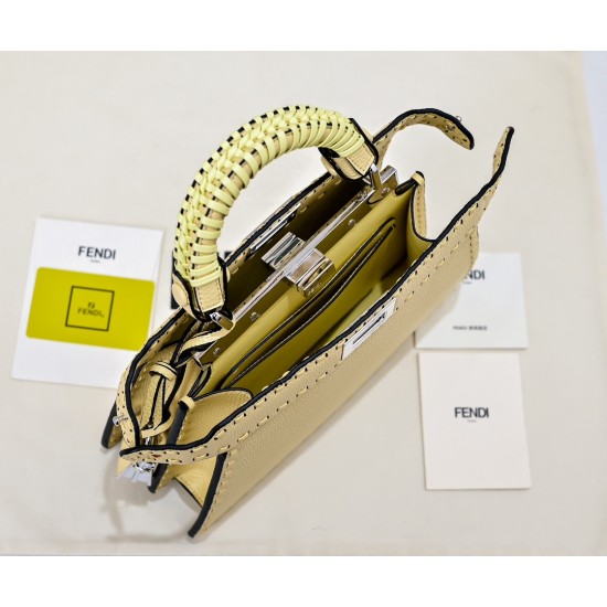 350 model 7705 the iconic peekaboo iseeu ideal compact handbag is hand-stitched with 306 stitches in the same color and large bright threads representing traditional selleria craftsmanship in a selection of dove grey cuoio romano leather with iconic natur