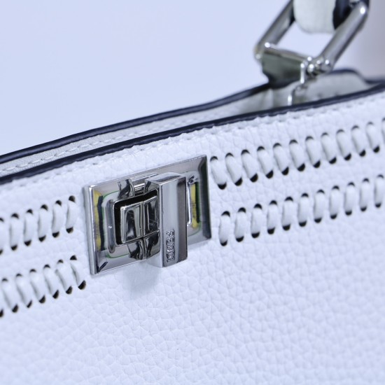 350 model 33208 the iconic peekaboo iseeu ideal compact handbag is hand stitched with 306 stitches in the same color with large bright threads representing traditional selleria craftsmanship in a selection of dove grey cuoio romano leather with signature 