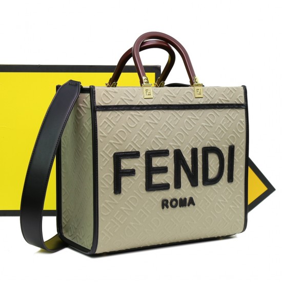 Lot 330FEND1 Sunshine medium tote bag in denim with FENDI Mirror pattern all over brown hard leather handles decorated with FENDI ROMA features spacious lined interior compartments with leather silhouette and gold-tone finish metal pieces with two carry h