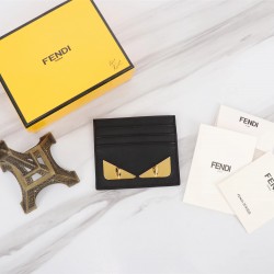 Brand FENDI Fendi style gold iron piece card case Item No. 2020568 color black gold iron piece material head layer imported nappa cowhide size 1059FENDI short clip card case Introduction spring and summer the latest card case using the head layer of impor
