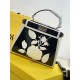 Upgraded Cowhide Lot 390 with Box Fendi's new iconic Peekaboo pouch in black canvas and patent leather is engraved with a rose motif displaying a natural canvas backing and is adorned with a signature twist lock on both sides.Canvas liningTwo compartments