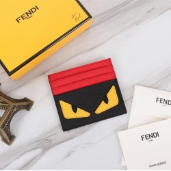Brand FENDI Fendi style cross pattern black red yellow sticker card case Item No. 2020568 color black orange red material head imported cross pattern cowhide size 1059FENDI short clip card case Introduction spring and summer the latest card case using the