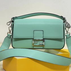 The new Fendi X TiffanyCo Limited Edition Baguette is a classic medium-sized baguette bag made of classic Tiffany BlueTM smooth cowhide leather. The FF hook and loop closure is made of sterling silver with Tiffany BlueTM3 enamel detailing depicting the do