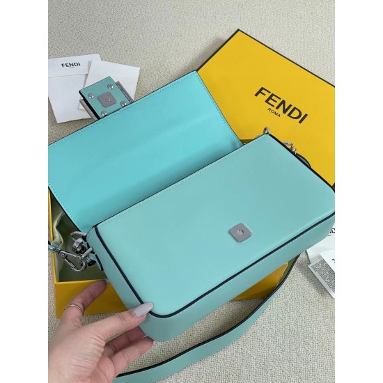 The new Fendi X TiffanyCo Limited Edition Baguette is a classic medium-sized baguette bag made of classic Tiffany BlueTM smooth cowhide leather. The FF hook and loop closure is made of sterling silver with Tiffany BlueTM3 enamel detailing depicting the do