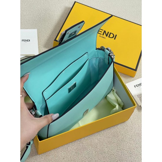 The new Fendi X TiffanyCo Limited Edition Baguette is a classic medium-sized baguette bag made of classic Tiffany BlueTM smooth cowhide leather. The FF hook and loop closure is made of sterling silver with Tiffany BlueTM3 enamel detailing depicting the do