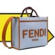 Lot 330FEND1 Sunshine medium tote bag in denim with FENDI Mirror pattern all over brown rigid leather handles decorated with FENDI ROMA features spacious lined interior compartments leather silhouette and gold finish metal pieces with two carry handles an