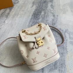 480 Exclusive Customized Actual M13656 Top Original Dynamic 163 This Nano No backpack is a sophisticated two-tone design for day and night this season. The bag is made of leather with gold chains and a lighter Monogram embossed pattern with a contrasting 