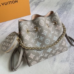 p530exclusive customized real top quality original reinforced chip version model Bella Bucket Bag draped in openworked cowhide perforated Monogram pattern subtle color gradient and light chain convey subtle aesthetics clever use of leather chain handles o