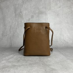p4805NF460 brown new mini bucket bag made of top imported lambskin leather is super soft and cost-effective can manage a variety of styles very playful and lovely can be shoulder crossbody handheld shoulder shape varied bag is small but very able to load 