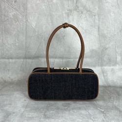 P6505BB173Beau Denim Medium Shoulder BagThe iconic Miu Miu denim fabric defines the personality of this Beau bag highlighting its slender proportionsContrasting leather details add a touch of bold and feminine eleganceLeather handlesGold hardwareZipper cl