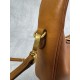 P6805BC125 Cognac soft cowhide leather with an aged effect gives the Wander a new modern elegance combining a refined silhouette with the bold experimental spirit of Miu Miu lcons Removable shoulder strap Gold-tone hardware Zipper closure Strap lining Eng