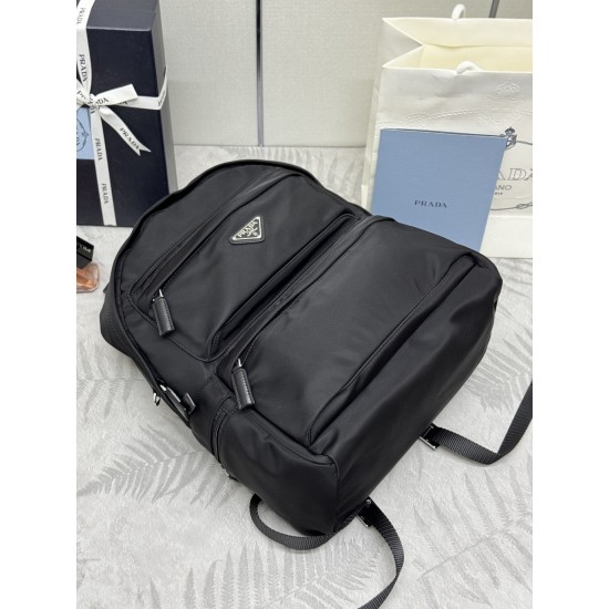 F500P home out of the new duffel bag 2VZ025 triangle label top original goods Taiwan nylon material adjustable straps back fabric Saffiano leather handles two-way zipper closure two zippered outside pockets nylon lining one zippered inside pocket and a po