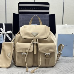 F480 with a full set of the right version of the counter packaging exclusive customized classic large backpack 1BZ811 milk tea color this nylon shoulder bag with exquisite Saffiano leather trim fusion of materials and decorated with triangular logo highli