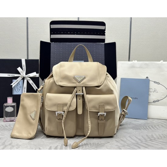 F480 with a full set of the right version of the counter packaging exclusive customized classic large backpack 1BZ811 milk tea color this nylon shoulder bag with exquisite Saffiano leather trim fusion of materials and decorated with triangular logo highli