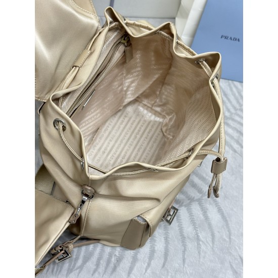 F480 with a full set of the right version of the counter packaging exclusive customized classic large backpack 1BZ811 milk tea color this nylon shoulder bag with exquisite Saffiano leather trim fusion of materials and decorated with triangular logo highli