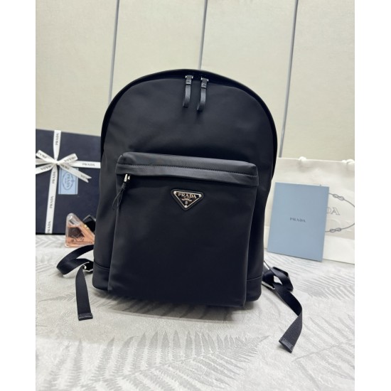 F520 Classic Shoulder Bag Newest Shoulder Bag 2V066A Made of imported Saffiano leather and imported nylon fabric Adjustable nylon shoulder straps Brushed metal hardware This nylon backpack with multiple pockets and padded back design is quite a design fea