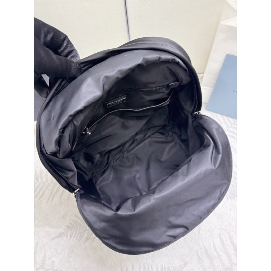 F520 Classic Shoulder Bag Newest Shoulder Bag 2V066A Made of imported Saffiano leather and imported nylon fabric Adjustable nylon shoulder straps Brushed metal hardware This nylon backpack with multiple pockets and padded back design is quite a design fea