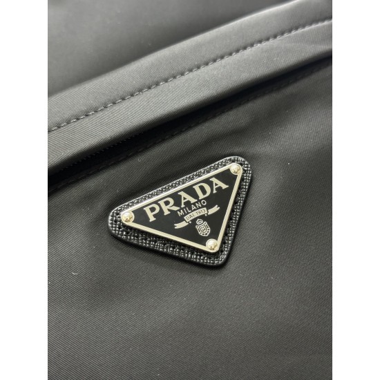 F520 Classic Shoulder Bag Newest Shoulder Bag 2V066A Made of imported Saffiano leather and imported nylon fabric Adjustable nylon shoulder straps Brushed metal hardware This nylon backpack with multiple pockets and padded back design is quite a design fea