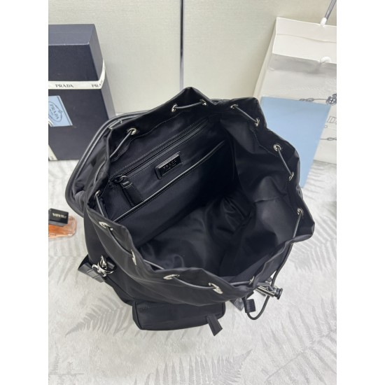 F600 new runway models 2VZ111 small shoulder back shoulder bag this runway models shoulder backpack using imported nylon fabric calfskin and top hardware front buckle flap and 2 pocket design with a removable nylon shoulder strap back and can be carried o