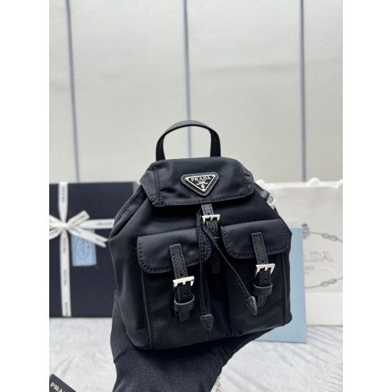 F400 with counter to the version of the full set of packaging exclusive customized mini small backpack 1BH029 shoulder bag This simple lines of the universal backpack can be transformed into a handbag through the removable shoulder straps to highlight the