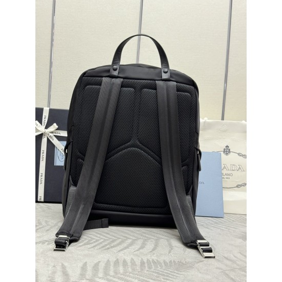 F500 classic pop-up duffel bag 2VZ104 triangular standard goods nylon material adjustable straps back fabric Saffiano leather carry handle zipper closure two zipper outer pockets nylon lining one zipper inner pocket and one pocket sewn to the interior wal