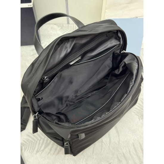 F500 classic pop-up duffel bag 2VZ104 triangular standard goods nylon material adjustable straps back fabric Saffiano leather carry handle zipper closure two zipper outer pockets nylon lining one zipper inner pocket and one pocket sewn to the interior wal
