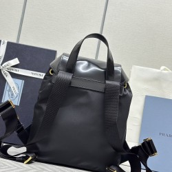 F610 with the counter version of the full set of packaging exclusive customized new backpack 1BZ074 this backpack combines several elements of imported nylon fabric and shiny cowhide leather top metal hardware accessories elegant and versatile with the ou