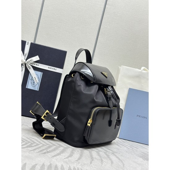 F610 with the counter version of the full set of packaging exclusive customized new backpack 1BZ074 this backpack combines several elements of imported nylon fabric and shiny cowhide leather top metal hardware accessories elegant and versatile with the ou