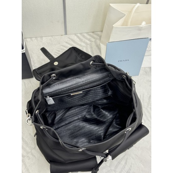 F560 new backpack 2VZ110 upgraded version of the nylon handbags this ReNylon backpack using classic nylon fabric design top hardware fusion of innovative and practical elements to present a refined and timeless style with a detachable shoulder strap a bag