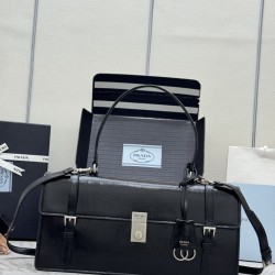 F850202525ss new pencil bag 1BN024 large this leather handbag inspired by the quite formal briefcase texture delicate glossy with a new attitude to re-interpret the classic office style silhouette using delicate soft detailing for the bag's classic shape 