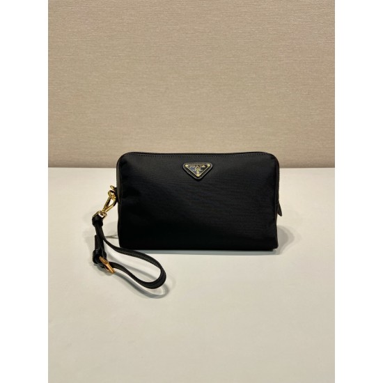 P220 New Clutch 1NS693 Gold Hardware This clutch is made of imported nylon fabric with a white lacquered triangular logo decorating the simple lines Open the bag to reveal a zippered interior pocket Removable leather wristlet for both men and women Lightw