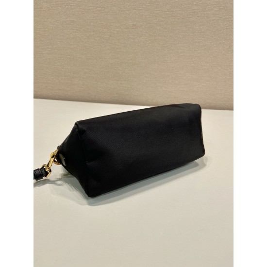 P220 New Clutch 1NS693 Gold Hardware This clutch is made of imported nylon fabric with a white lacquered triangular logo decorating the simple lines Open the bag to reveal a zippered interior pocket Removable leather wristlet for both men and women Lightw