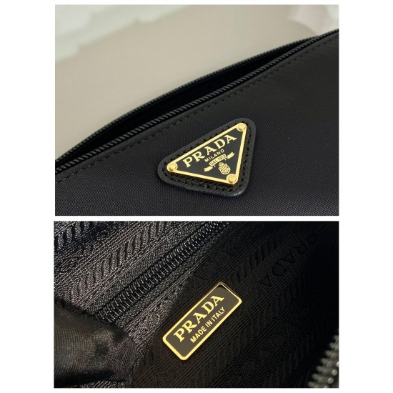 P220 New Clutch 1NS693 Gold Hardware This clutch is made of imported nylon fabric with a white lacquered triangular logo decorating the simple lines Open the bag to reveal a zippered interior pocket Removable leather wristlet for both men and women Lightw