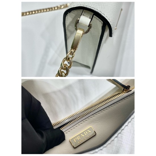 p520New crossbody bag 1BD318This flap shoulder bag is made of Saffiano leather with lambskin interior to show the artisanal design of the soft design at a glanceThe tip of the flap closure is adorned with enameled metal triangular logoWith a long detachab